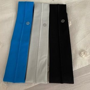 Three piece lululemon wide headband bundle with grips plus lulu bag